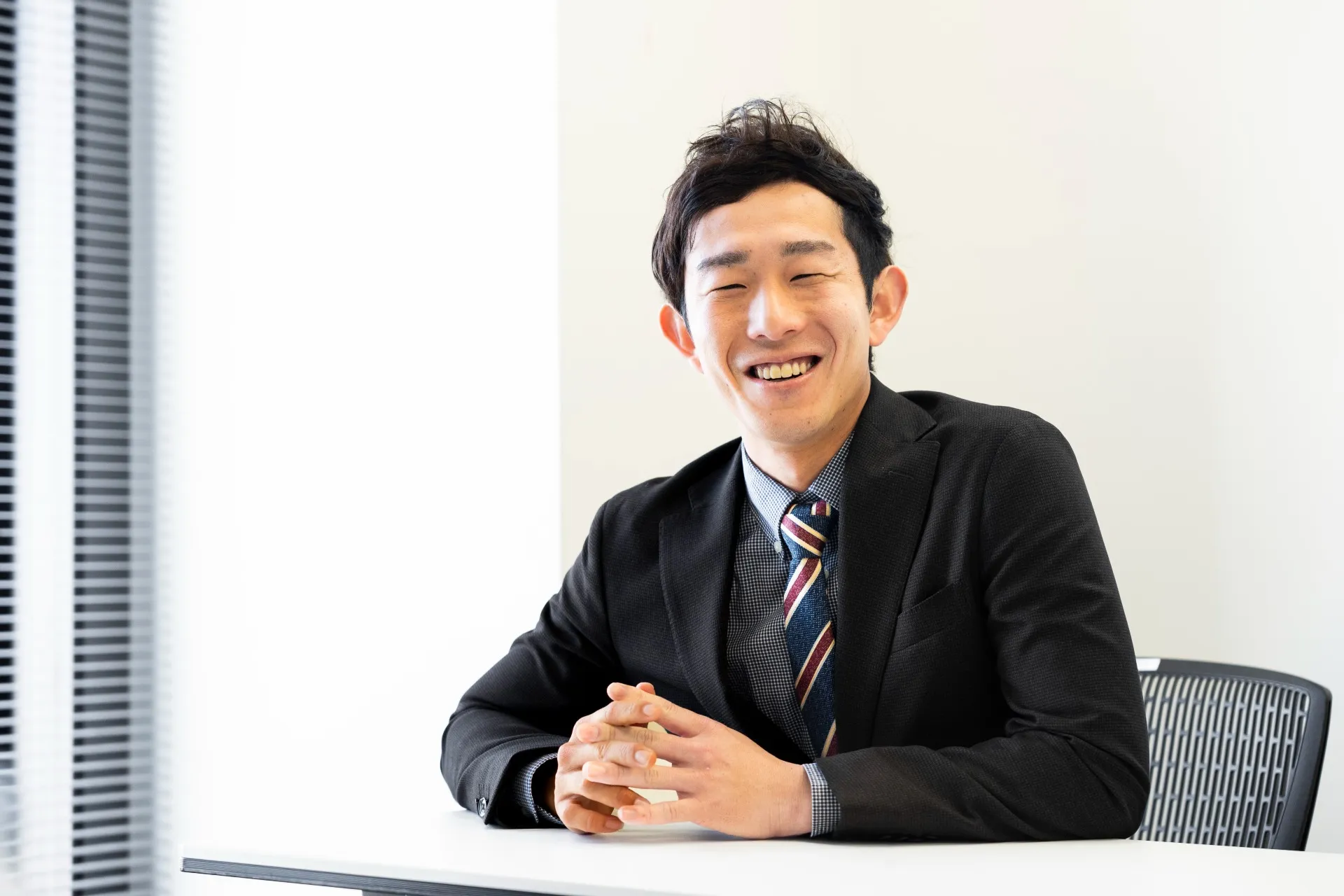 職場での古賀さん